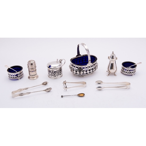 33 - A mixed group of silver including; a glass lined swing handle bonbon dish Chester 1897, maker's mark... 