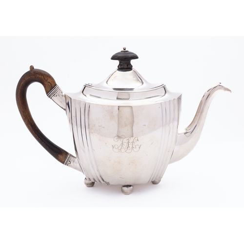 347 - A George III silver teapot by William, Peter and Anne Bateman, London 1801, of oval form, domed hing... 