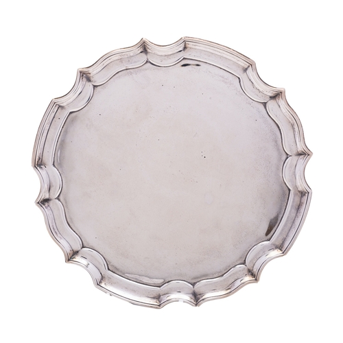 372 - A George VI silver salver by James Deakin & Son, Sheffield 1944, of plain circular form, piecrust bo... 