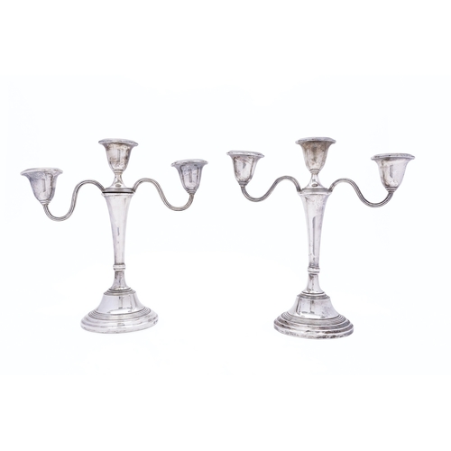 375 - A pair of Elizabeth II silver twin branch candelabra by Barrowclift Silvercraft, Sheffield 1973, fix... 