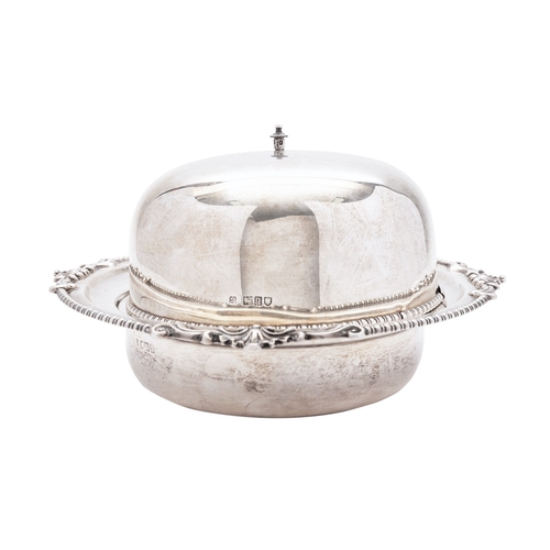 392 - A George V silver muffin dish by W & C Sissons, London 1911, the domed lid with beaded rim, set on a... 