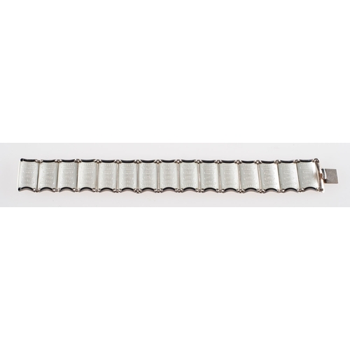 419 - Einar Modahl.  A Norwegian enamel bracelet, made up of articulated links with white and black enamel... 