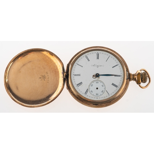 443 - Elgin. A pocket watch, with ornate engraving to front and back panels, white enamelled dial with Rom... 