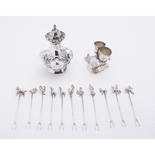 49 - A mixed group of silver and glass including; a set of six shot glasses with Sterling silver mounts, ... 