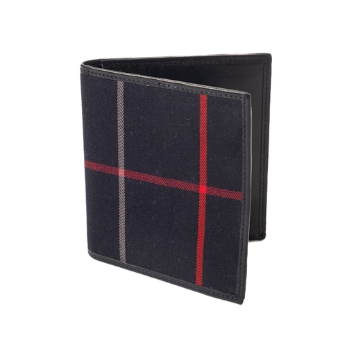 529 - Burberry, London, A navy blue leather and tartan Universal wallet