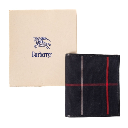 529 - Burberry, London, A navy blue leather and tartan Universal wallet