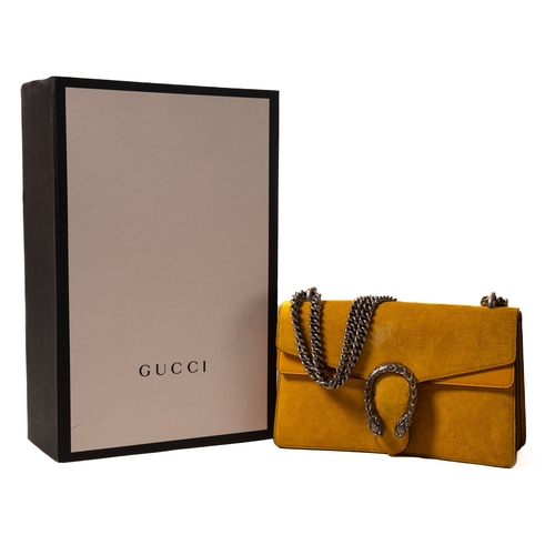 546 - Gucci. A Gucci Dionysus handbag, with a mustard yellow suede exterior with silver hardware and yello... 