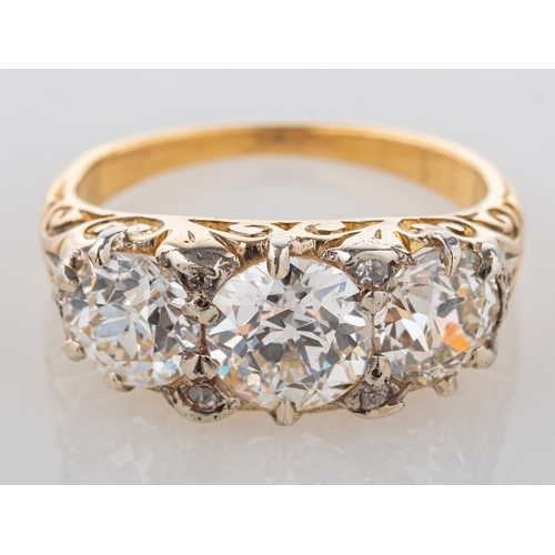 617 - An antique diamond three stone ring, claw set with three old European-cut diamonds, diamonds approx.... 