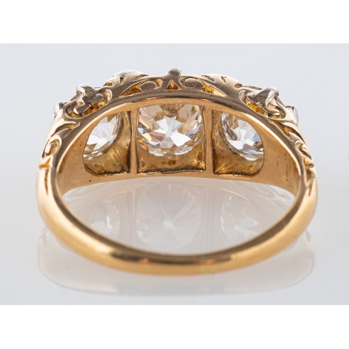 617 - An antique diamond three stone ring, claw set with three old European-cut diamonds, diamonds approx.... 