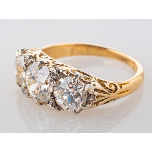 617 - An antique diamond three stone ring, claw set with three old European-cut diamonds, diamonds approx.... 