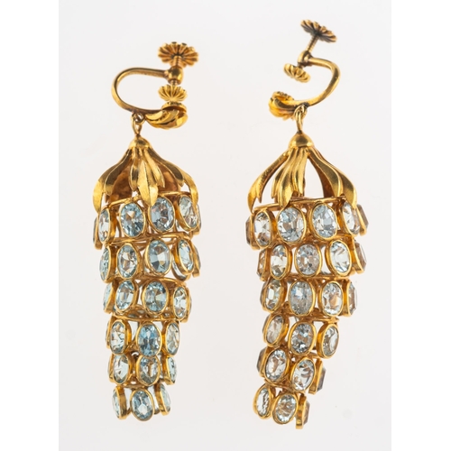 618 - A pair of aquamarine chandelier earrings, a pair of drop earrings of openwork articulated design, ea... 