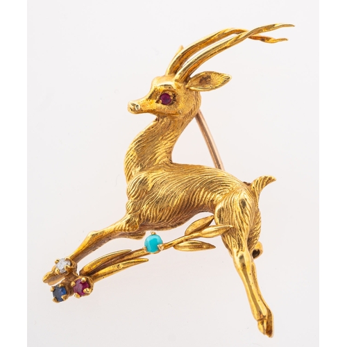 621 - Ben Rosenfeld.  An 18ct yellow gold Springbok brooch, set with a brilliant-cut diamond, three circul... 