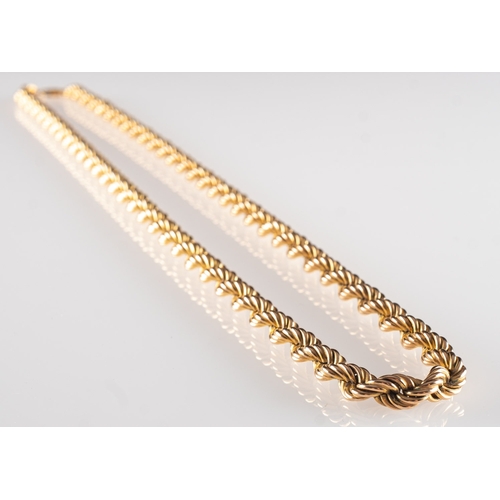 633 - A 9ct yellow gold twisted rope chain, UK import mark to jump ring, length approx. 62.0cm, 90.0grams.