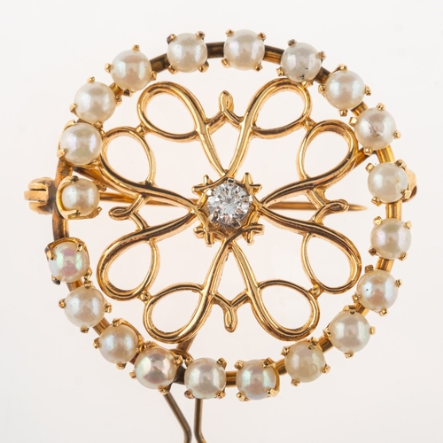 664 - A pearl and diamond brooch, of circular openwork form, set to the centre with a brilliant-cut diamon... 