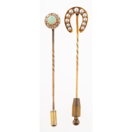 719 - Two antique stick pins, one set with an opal cabochon with a surround of old mine-cut diamonds, unma... 