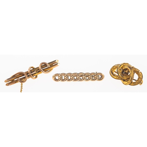 720 - A group of three antique brooches, including a 9ct gold bar brooch in the form of intertwined links,... 