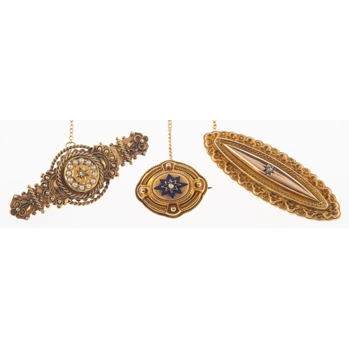 725 - Three Victorian brooches, including a Victorian navette shaped mourning brooch, star set to the cent... 