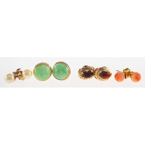 729 - A mixed group of stud earrings, with four pairs of earrings including a pair of jade cabochon set st... 