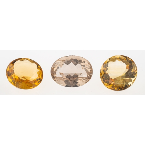 754 - A group of three loose semi-precious gemstones to include: A loose circular-cut citrine, approx. 12.... 