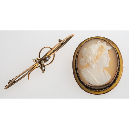 767 - A pearl brooch and a cameo brooch, an openwork bar brooch set with seed pearls, marked 9ct, length a... 