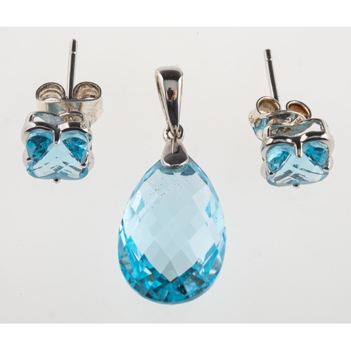 779 - A blue topaz pendant and earrings, the pendant set with a teardrop shaped mixed-cut blue topaz, bale... 