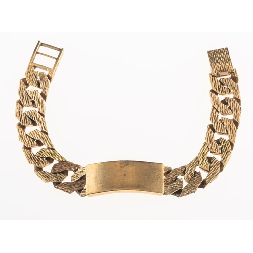 797 - A heavy identity bracelet, with plain central identity panel and textured flat curb links, ladder cl... 