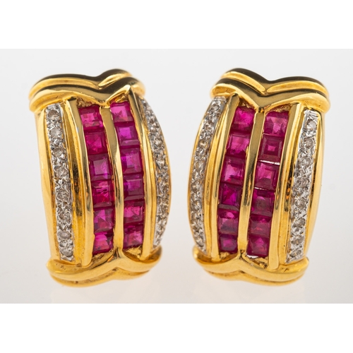 805 - A pair of ruby and diamond earrings, each set with two rows of square-cut rubies and two rows of bri... 