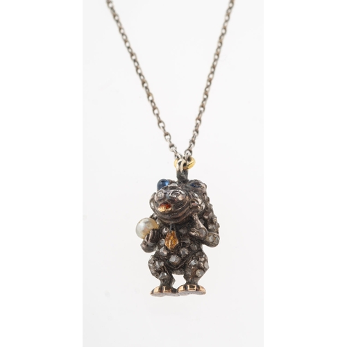 811 - A diamond, sapphire, pearl and enamel 'creature' pendant with chain, a little 'creature' pendant set... 