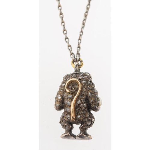 811 - A diamond, sapphire, pearl and enamel 'creature' pendant with chain, a little 'creature' pendant set... 