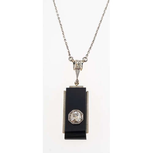 816 - An Art Deco onyx and diamond necklace, the attached pendant of bi-metal and geometric design, set wi... 