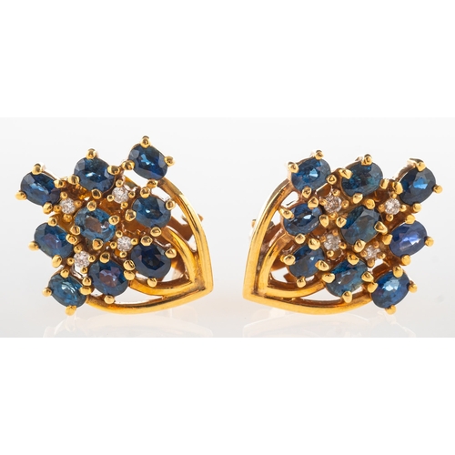 825 - A pair of sapphire and diamond cluster earrings, each set with nine oval-cut sapphires, sapphires ap... 