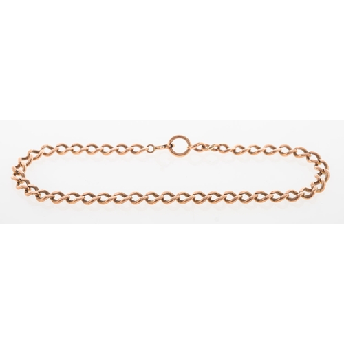 832 - A curb link bracelet, the bolt ring marked 9K, length approx. 21.0cm, 7.4grams.