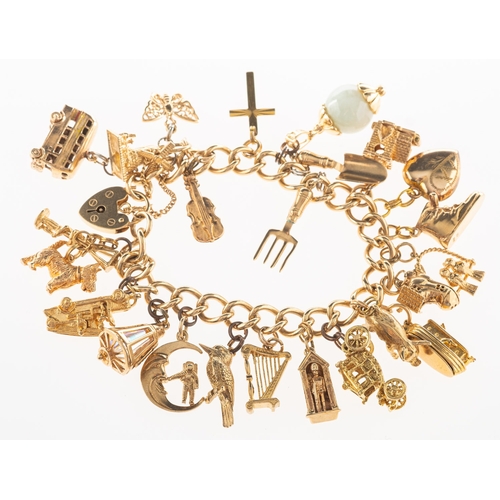 833 - A curb link charm bracelet with charms, the bracelet with heart padlock and safety chain, padlock an... 