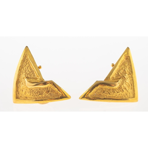 838 - A pair of triangular shaped earrings, with a polished and textured finish, post and safety clip fitt... 