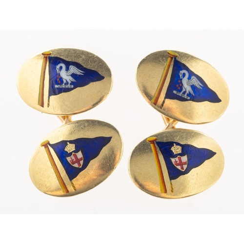 842 - A pair of oval enamelled cufflinks by Benzie Cowes, one face enamelled with the flag for the Royal L... 