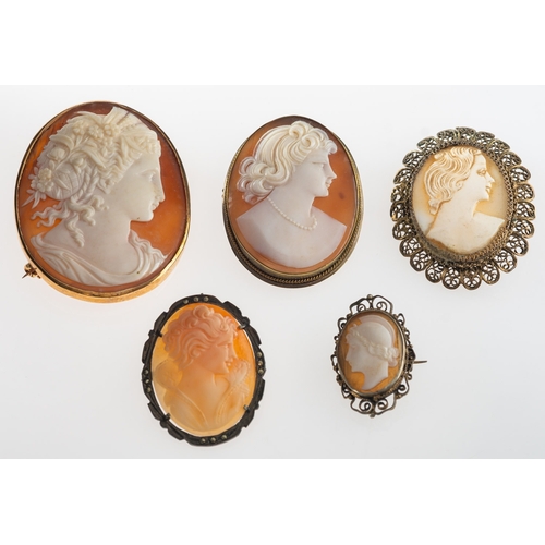 866 - A group of five cameos, a large cameo brooch with a plain mount, unmarked, length approx. 5.0cm, 16.... 