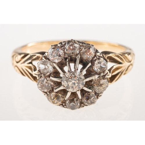 872 - A Victorian diamond cluster ring, the flowerhead cluster of openwork design and set with old-cut dia... 