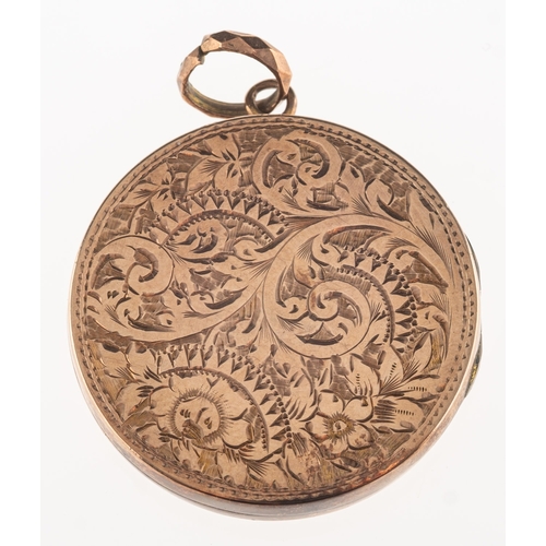 892 - A circular locket, with foliate and floral engraving, unmarked, diameter approx. 3.0cm, 6.5grams.