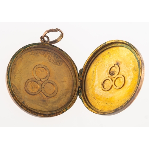 892 - A circular locket, with foliate and floral engraving, unmarked, diameter approx. 3.0cm, 6.5grams.