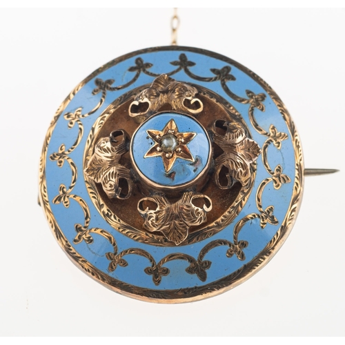 897 - A Victorian mourning brooch, of circular form, star set to the centre with a seed pearl, with a surr... 