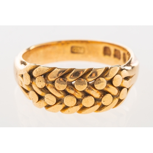 899 - A Victorian 18ct gold keeper ring, with a braided section to the front, UK hallmark, size N, 6.9gram... 