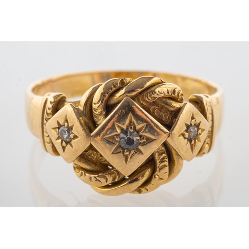 902 - An early 20th century 18ct gold and diamond ring, an ornately designed ring, star set with three sin... 