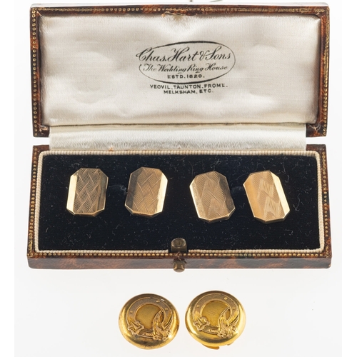 912 - A pair of cufflinks and two buttons, a boxed pair of cufflinks with engine turned engraving, chain l... 