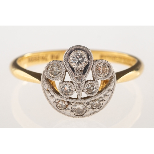 915 - An Art Deco diamond ring, grain and milgrain set with a mix of older-cut diamonds, diamonds approx. ... 