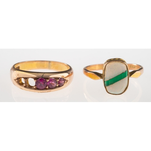 916 - Two gemstone set rings, including a ring set with five circular-cut pink stones, possibly pink tourm... 