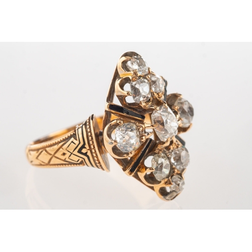 923 - A Victorian diamond and enamel ring, of navette form set with nine old mine-cut diamonds, diamonds a... 