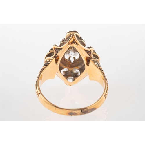 923 - A Victorian diamond and enamel ring, of navette form set with nine old mine-cut diamonds, diamonds a... 