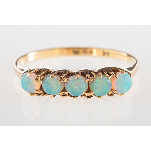 931 - An antique five stone opal ring, claw set with five opal cabochons, indistinct mark, size L1/2 to M,... 