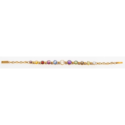 943 - An Art Deco multi-stone bracelet, set with an array of multi-coloured gemstones including white sapp... 