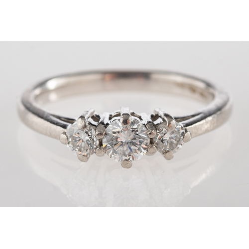 950 - A platinum three stone ring, claw set with three brilliant-cut diamonds, diamonds approx. 0.50 carat... 